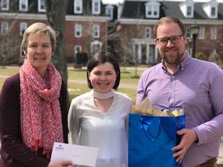 From left to right: 
Dr. Norine Verberg (Sociology), Kenzie MacNeil, and Professor Barry MacKenzie (History, Catholic Studies)